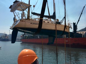 Our sailboat being loaded onto a freighter in Manzanillo, Mexico.