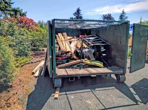 Junk and trash removed from the garage filled 1/3 of a large dumpster!