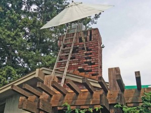 After removing the bad bricks the chimney resembled swiss cheese.